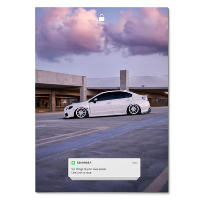Subaru WRX parked under colorful evening sky with motivational text poster wall art.