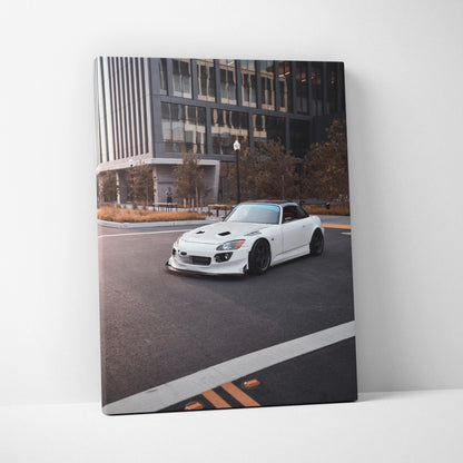 White Honda S2000 sports car on city street canvas wall art in vertical format.