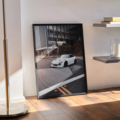 Honda S2000 car poster wall art featuring white sports car on urban street in black frame.