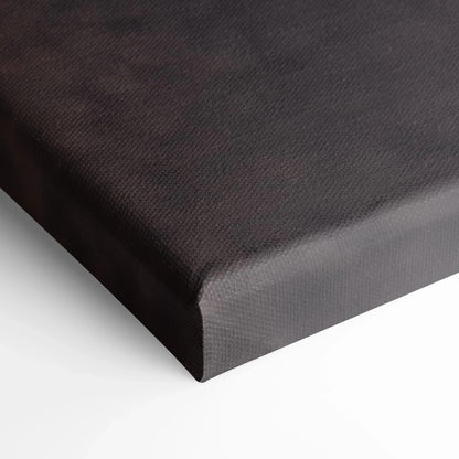 Close-up of black textured canvas corner with subtle matte finish for wall art or canvas art display.