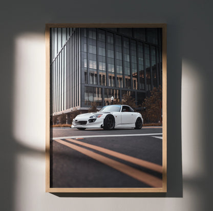 Honda S2000 white sports car poster wall art with modern urban building background in wooden frame.