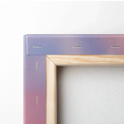 Close-up of wooden frame and stretched canvas corner for vertical wall art print.