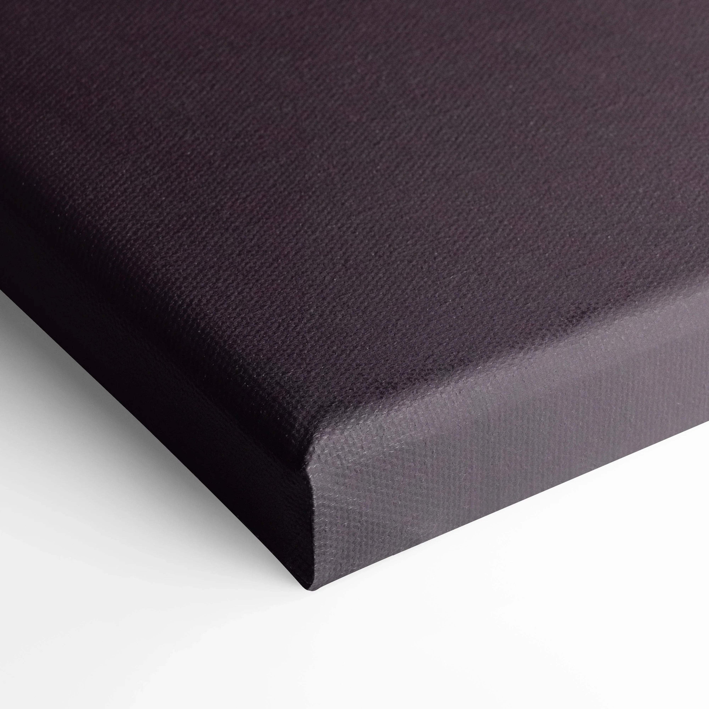 Black canvas corner close-up showing textured wall art material and clean edges.