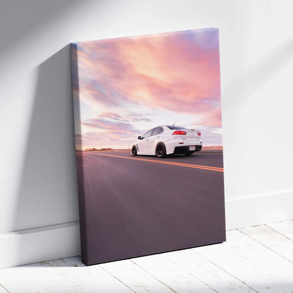 Mitsubishi Evo 10 white car on road at sunset vertical canvas wall art with vivid sky.