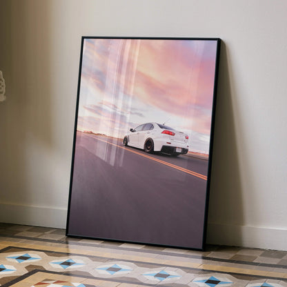 Mitsubishi Evo 10 poster with white car on road at sunset, vibrant sky wall art.