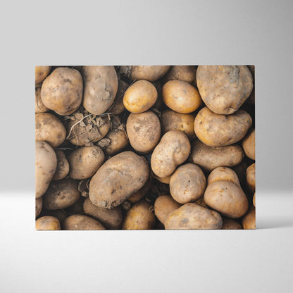 Rustic potato close-up on canvas wall art, kitchen decor with earthy tones.