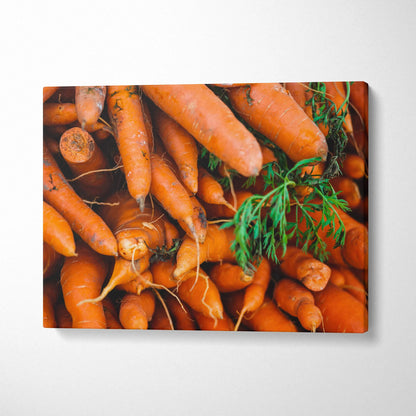 Canvas wall art featuring vibrant orange carrots with green tops, perfect for colorful home decor.