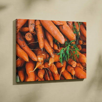 Bright orange carrots with green tops on a vibrant canvas wall art print.