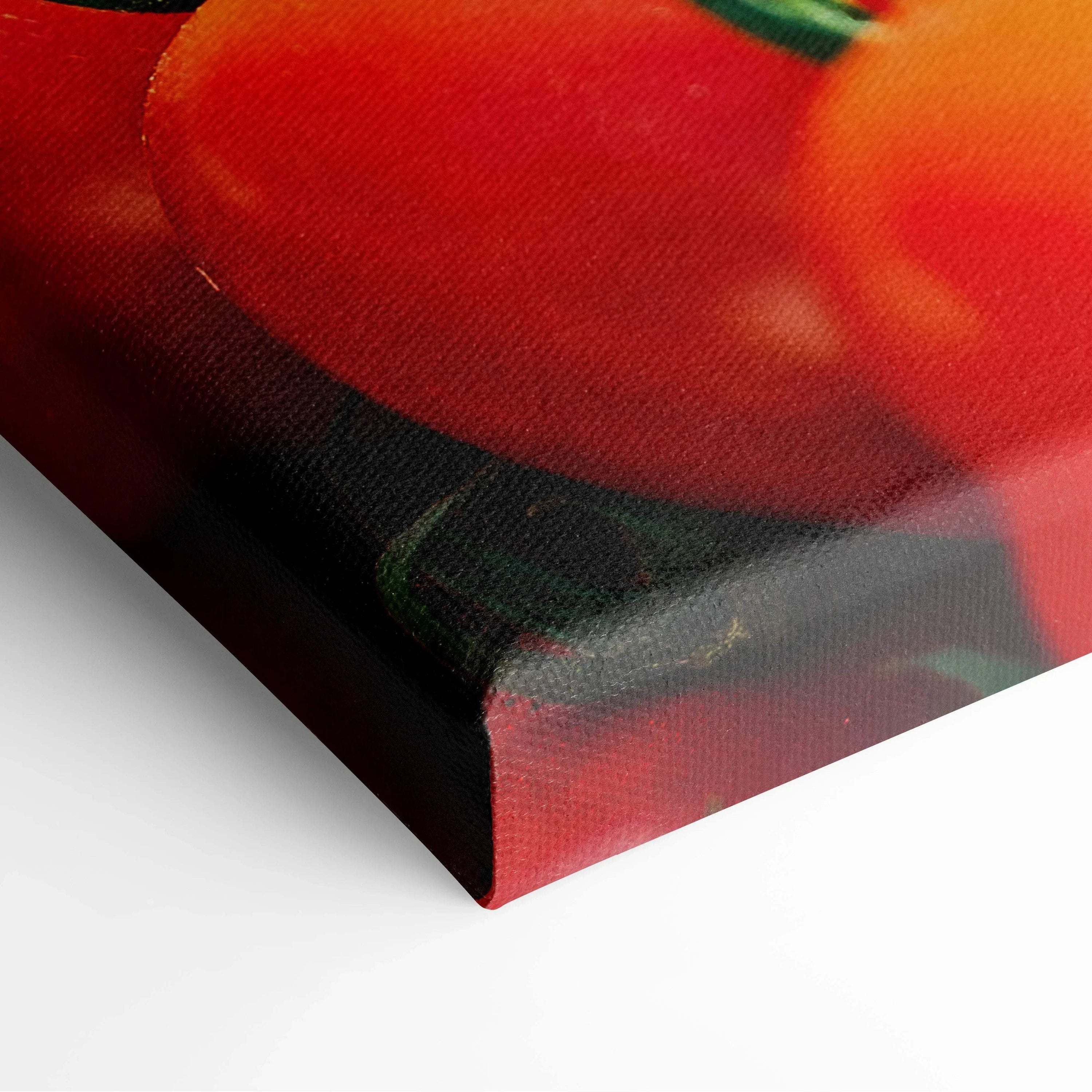 Close-up of vibrant red tomato canvas wall art with rich color saturation on thick stretched canvas.