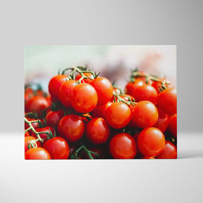 Canvas wall art featuring vibrant red tomatoes on the vine, highlighting fresh food decor for kitchen.