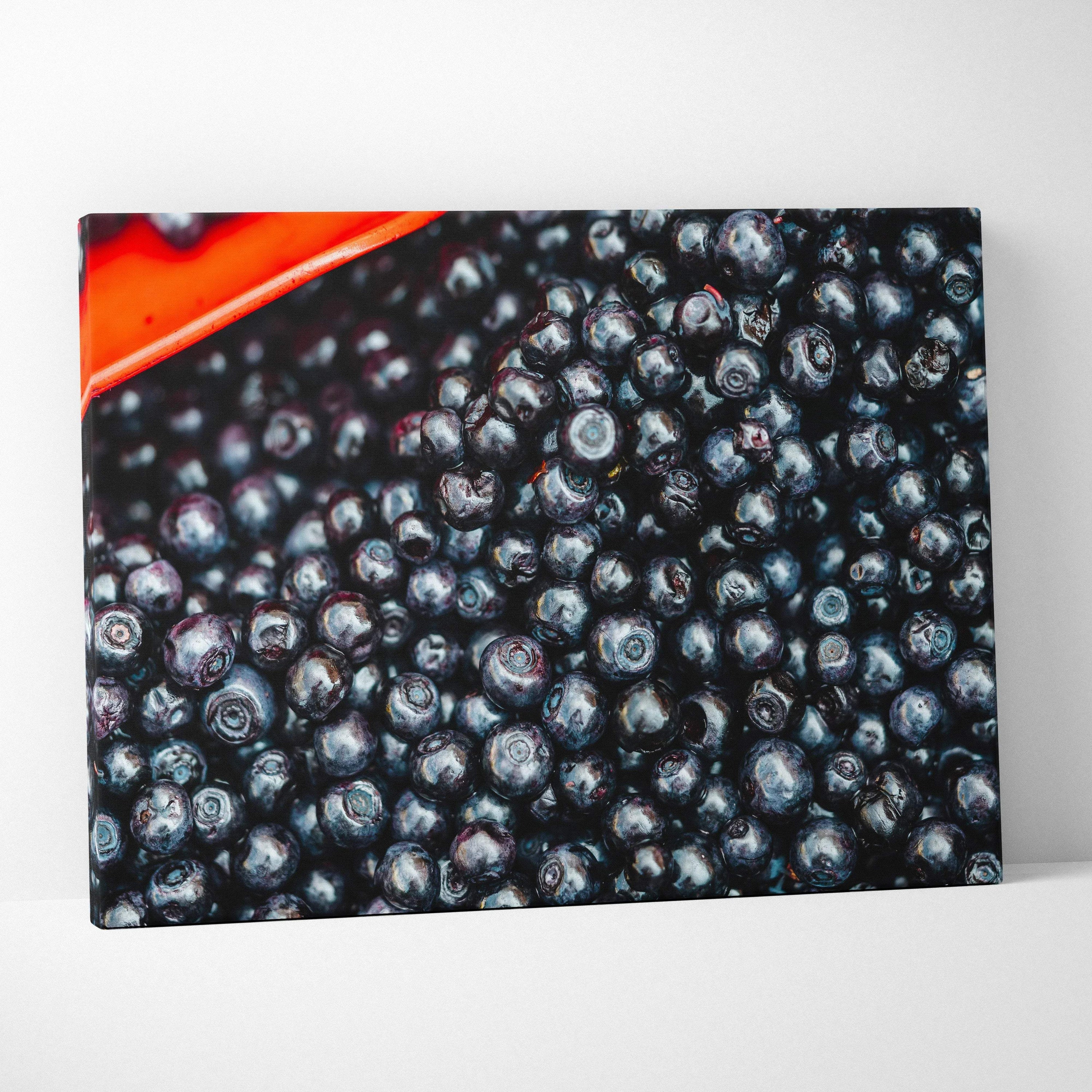 Vibrant blueberries close-up on canvas wall art with rich colors, perfect for home decor.