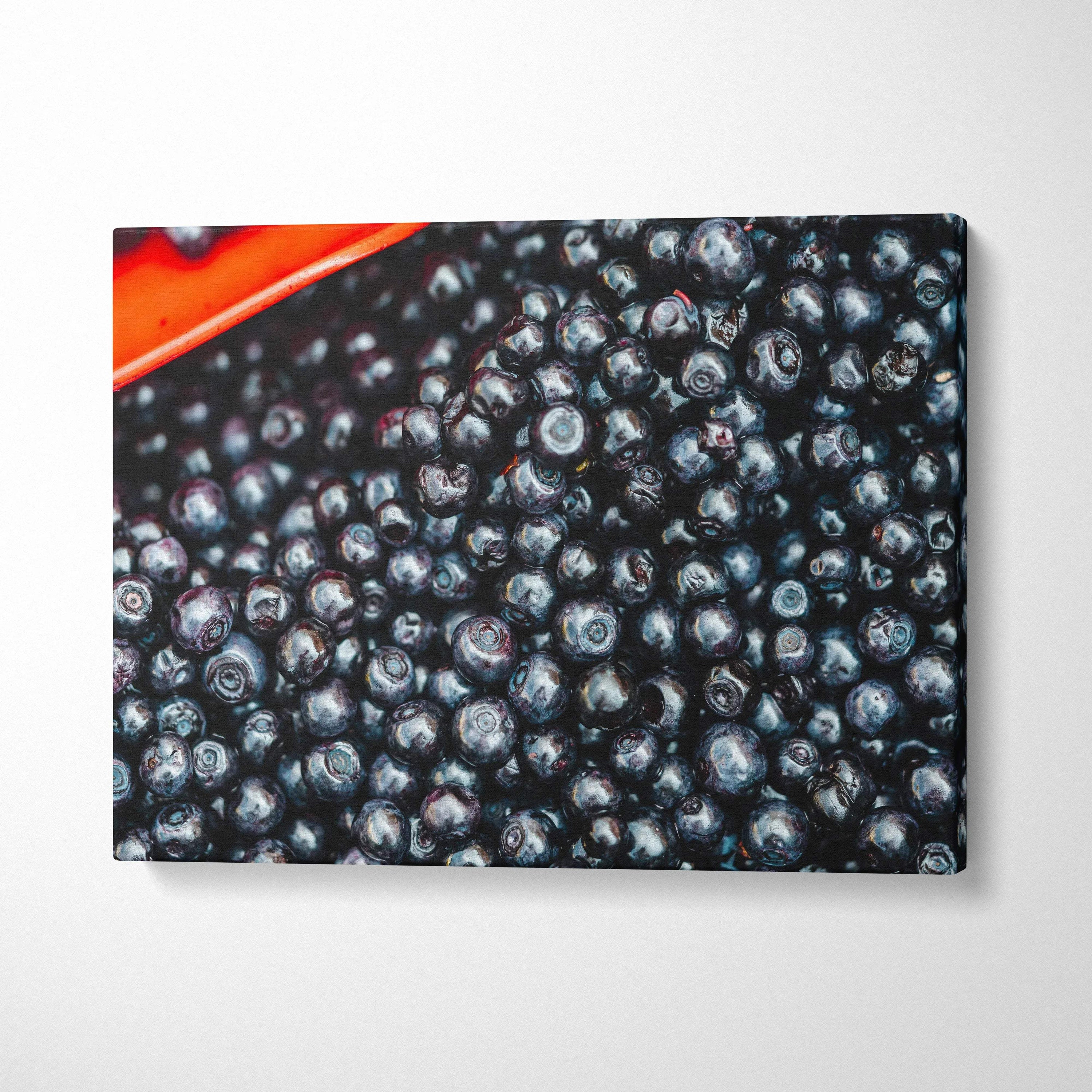 Vibrant blueberries close-up canvas wall art with rich blue tones for home decor.