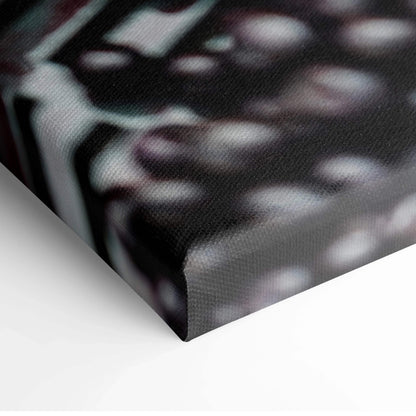 Close-up of vibrant blueberry-themed canvas wall art with textured fabric and museum-quality print finish.