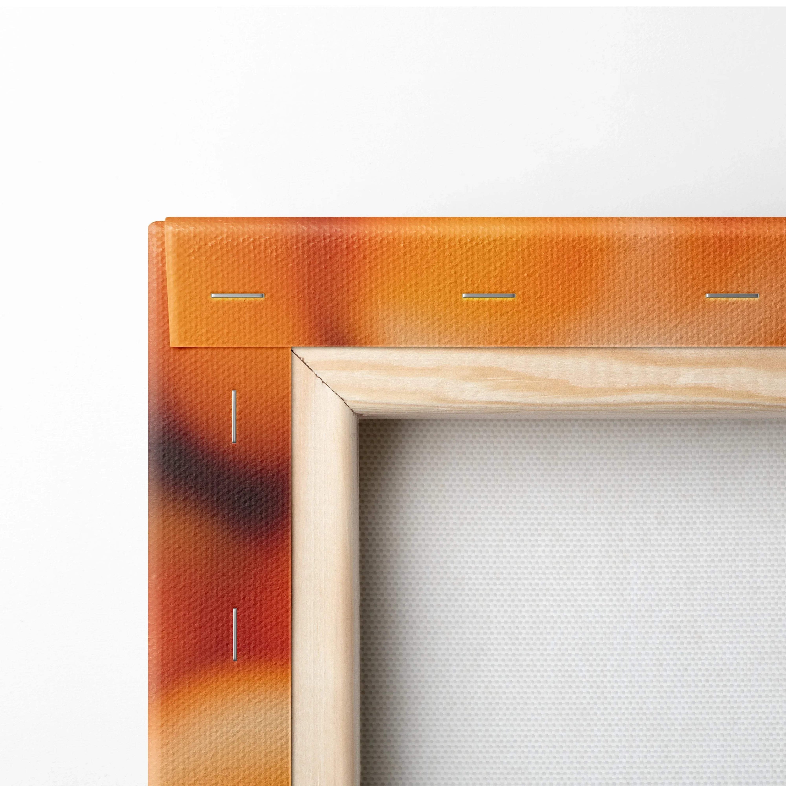 Close-up of wooden stretcher frame with vibrant orange and red canvas edges for wall art decor.