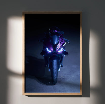 BMW S1000RR motorcycle with glowing headlights poster wall art in wooden frame on dark background.