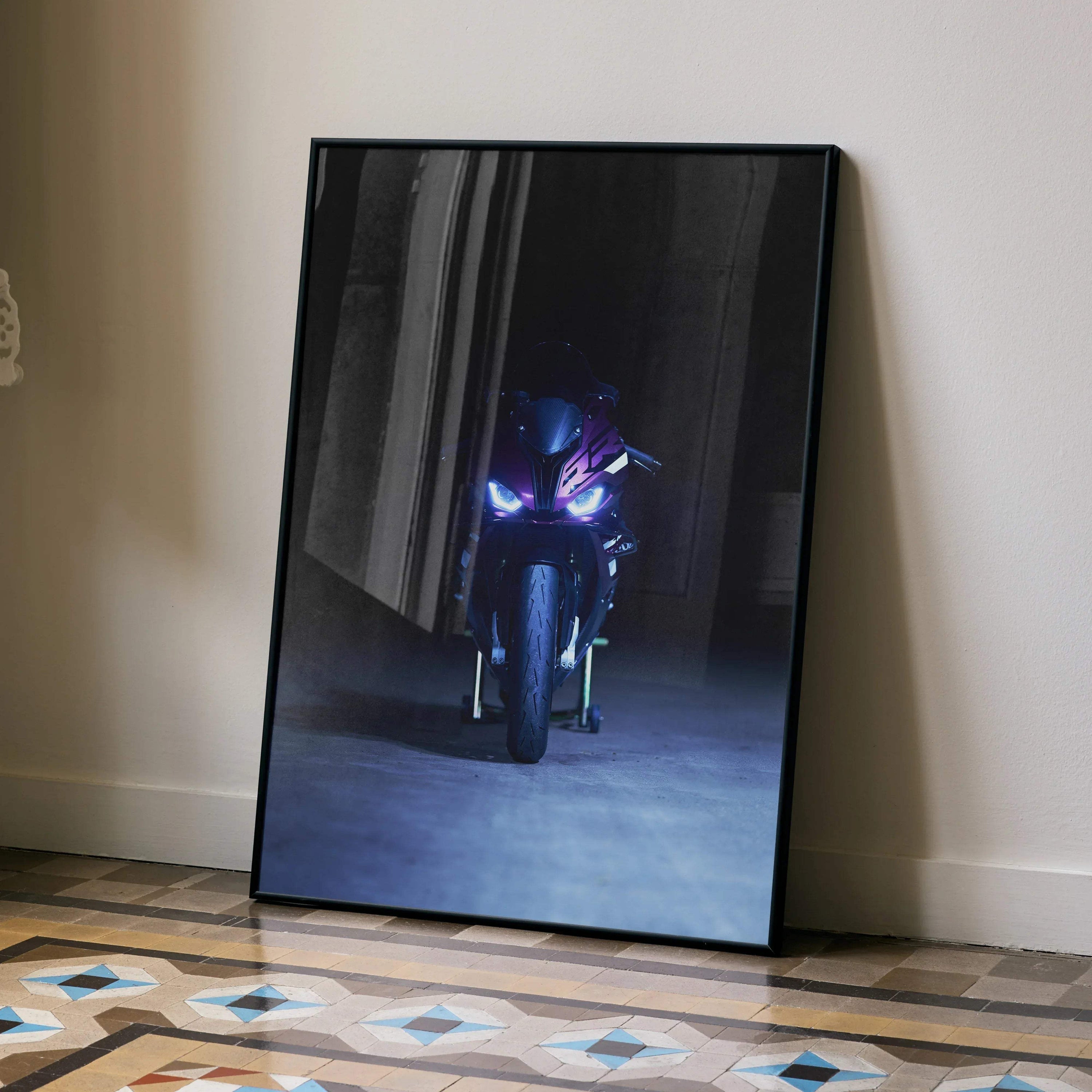 Black-framed poster featuring BMW S1000RR motorcycle with headlights on in dark setting, wall art design.
