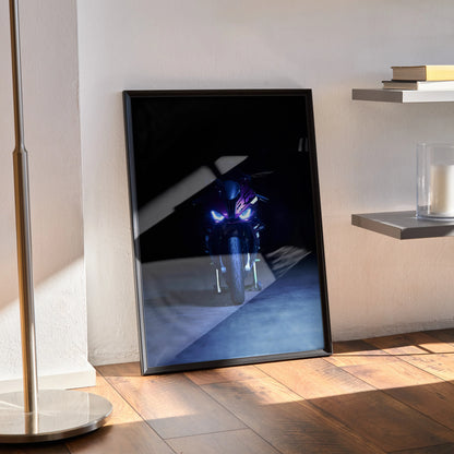 BMW S1000RR motorcycle poster with dark, dramatic lighting leaning against wall as modern wall art.