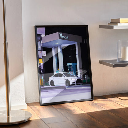 Mitsubishi Evo 10 high resolution poster in black frame leaning on wall, modern car wall art.