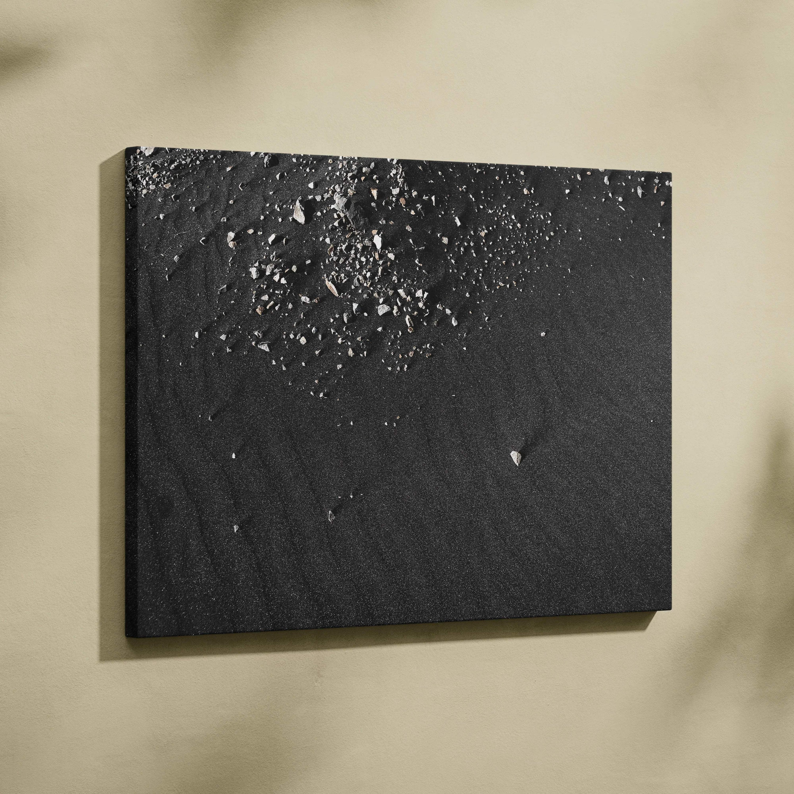 Black abstract digital canvas art with textured crater-like and ripple details for wall decor.