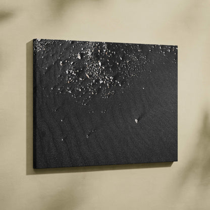 Black abstract digital canvas art with textured crater-like and ripple details for wall decor.