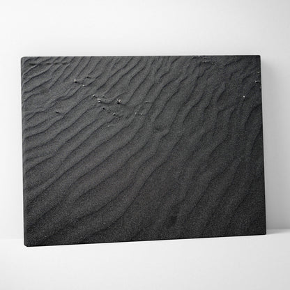 Black abstract digital art canvas with textured ripple patterns mimicking sand dunes.