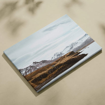 Canvas print of Nordic Icelandic snowy mountain coastline in serene blue tones