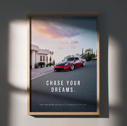 Motivational poster wall art featuring a red Nissan 370z on a street with "Chase Your Dreams" text.