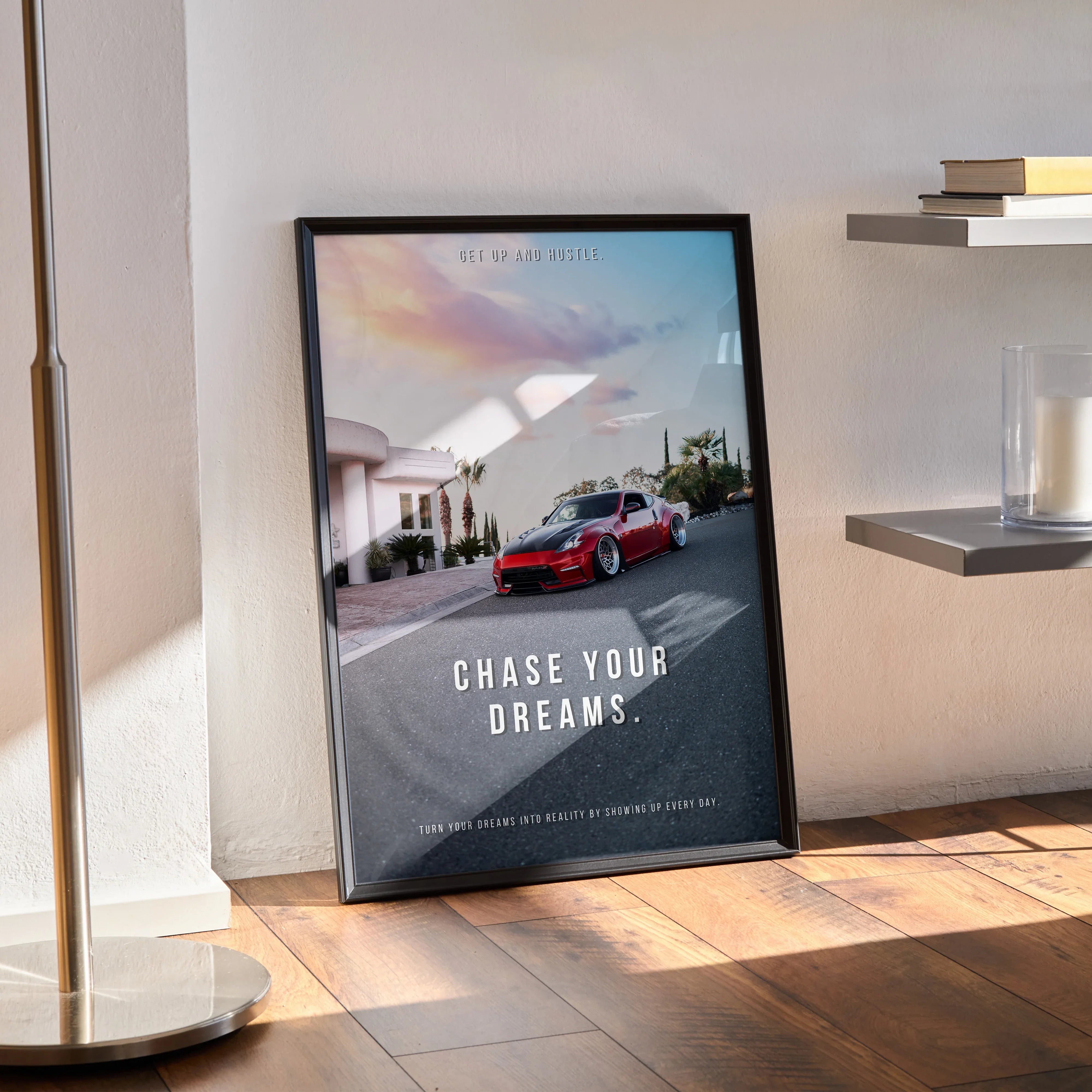 Motivational poster wall art featuring red Nissan 370z with inspiring text "Chase Your Dreams" in black frame.