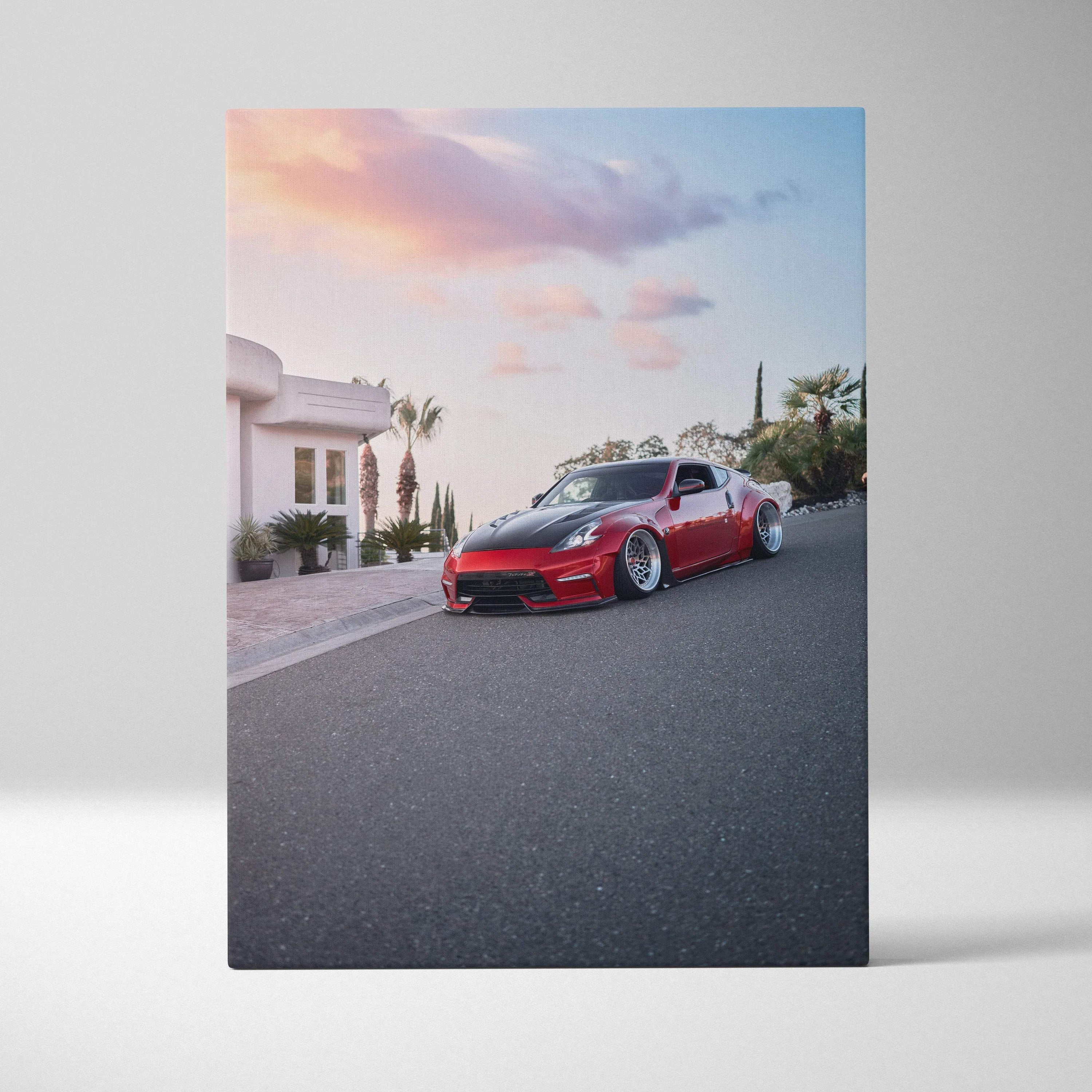 Red Nissan 370z parked on road at sunset canvas wall art print vertical orientation.