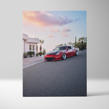 Red Nissan 370z parked on road at sunset canvas wall art print vertical orientation.