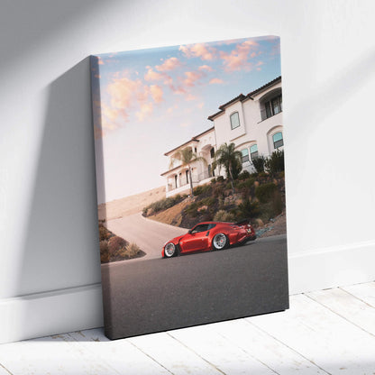 Red Nissan 370z parked on hillside road at sunset canvas wall art print.