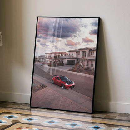 Nissan 370z poster showcasing red sports car on suburban street at sunset wall art.
