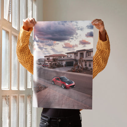 Nissan 370z red sports car on suburban street at sunset poster wall art.