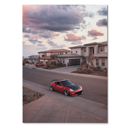 Red Nissan 370z sports car parked in suburban neighborhood at sunset poster wall art.
