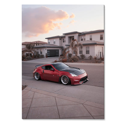 Red Nissan 370z sports car parked on suburban street at sunset, automotive wall art poster.
