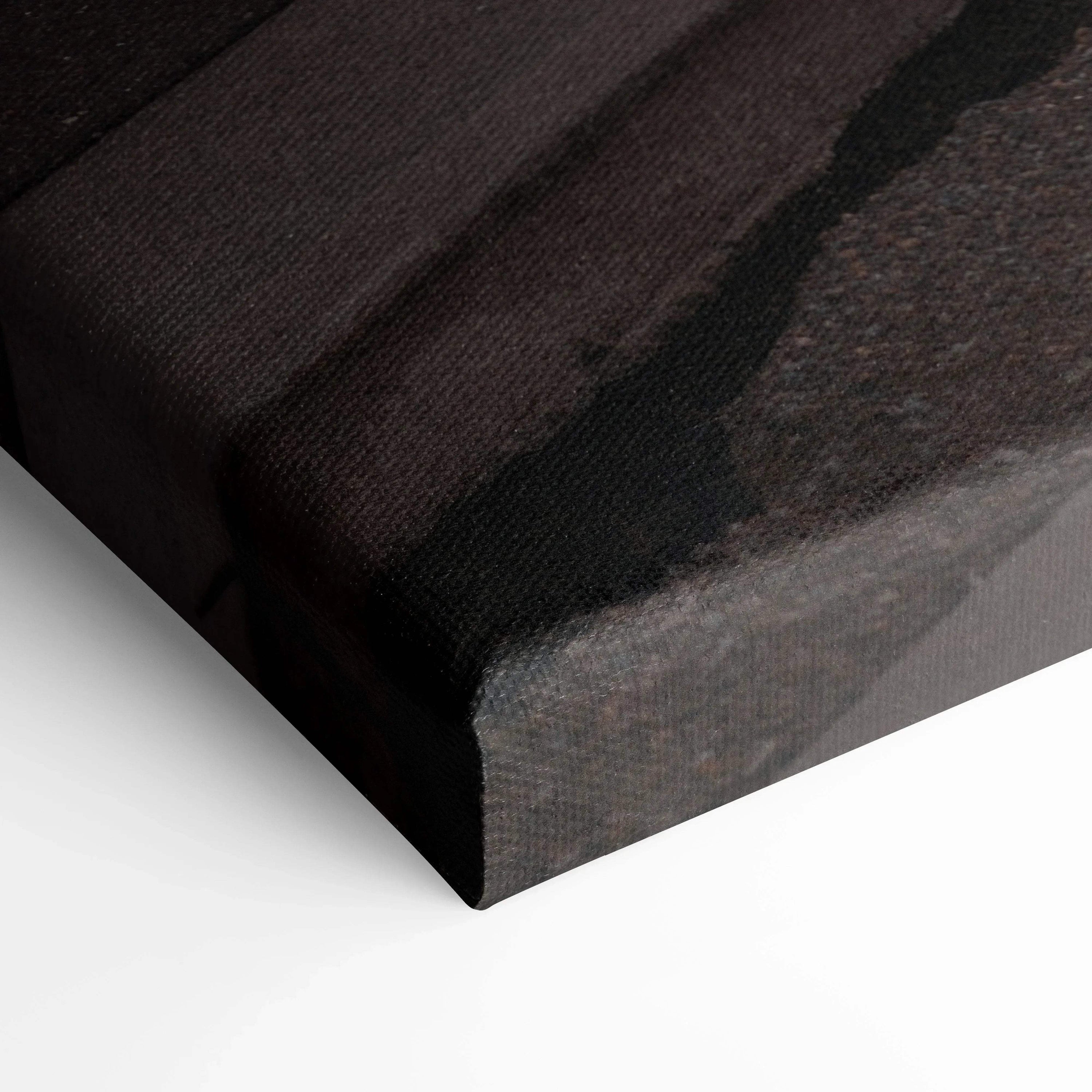 Close-up of Nissan 370z sunset scene printed on textured canvas wall art with deep black and warm brown tones.