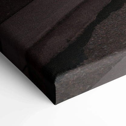 Close-up of Nissan 370z sunset scene printed on textured canvas wall art with deep black and warm brown tones.