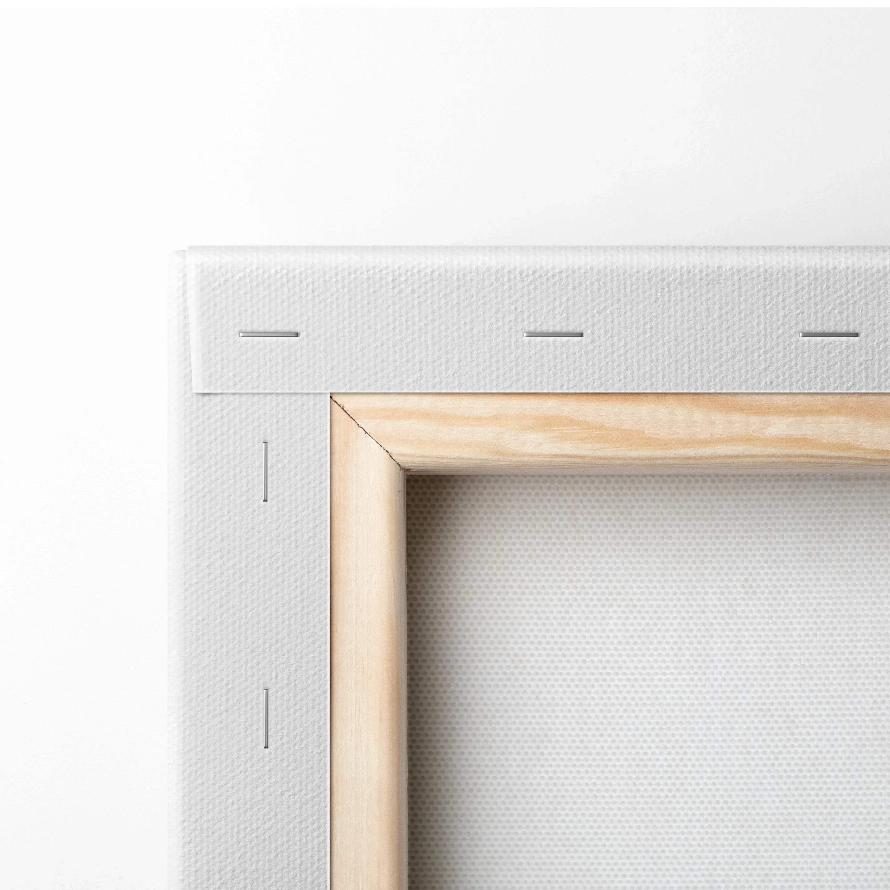 Corner close-up of white stretched canvas with wooden frame and staples for wall art Canvas Art.