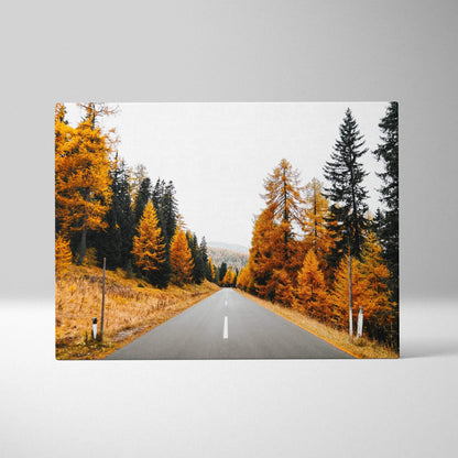 Vibrant autumn road framed by orange and green trees on canvas wall art with serene nature landscape.