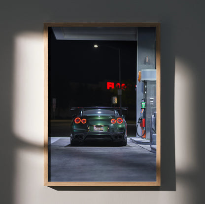 Nissan GTR R35 rear view at gas station at night wall art poster in wood frame.