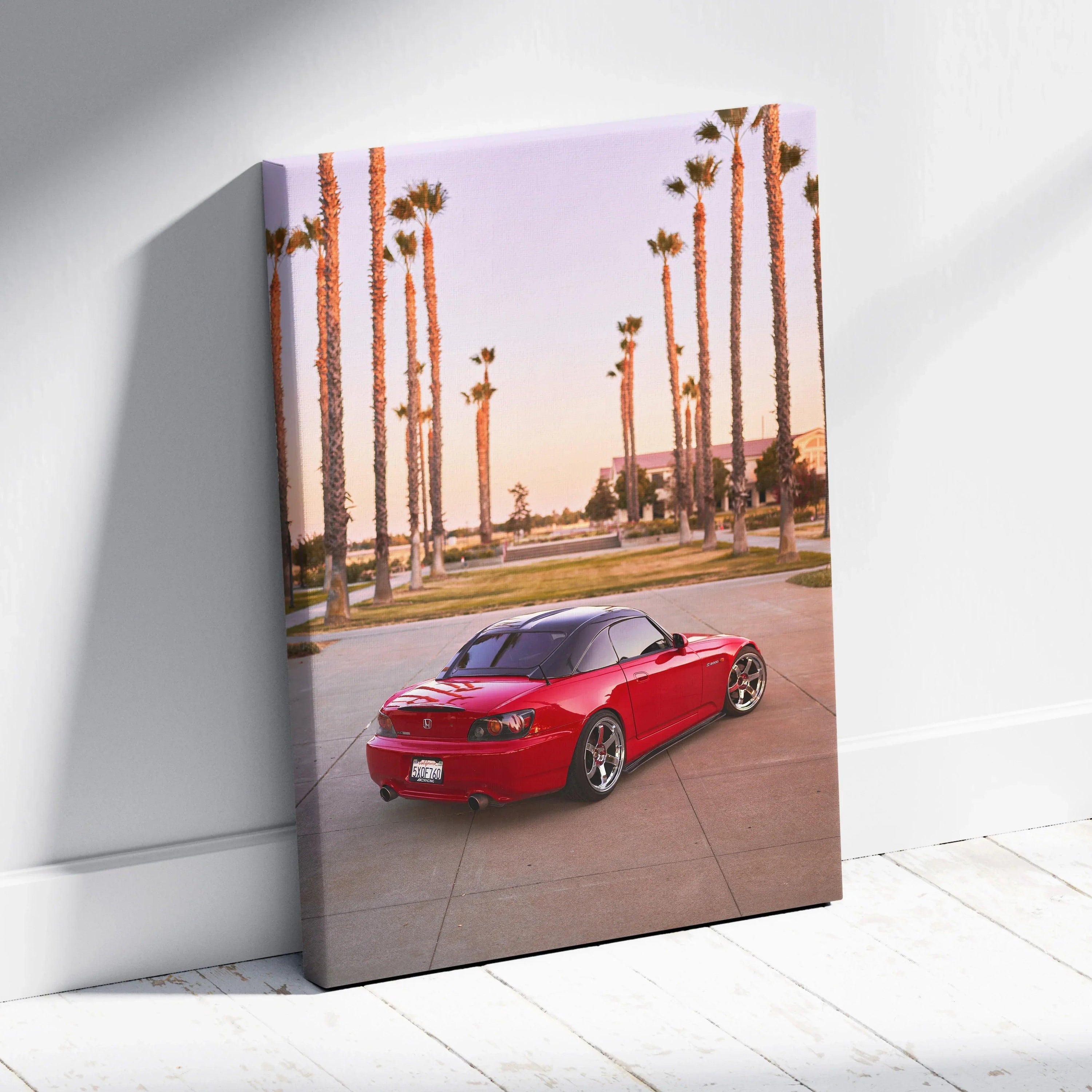 Red Honda S2000 sports car canvas art with palm trees and sunset, vertical wall art.