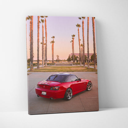 Red Honda S2000 sports car with palm trees background on vertical canvas wall art.