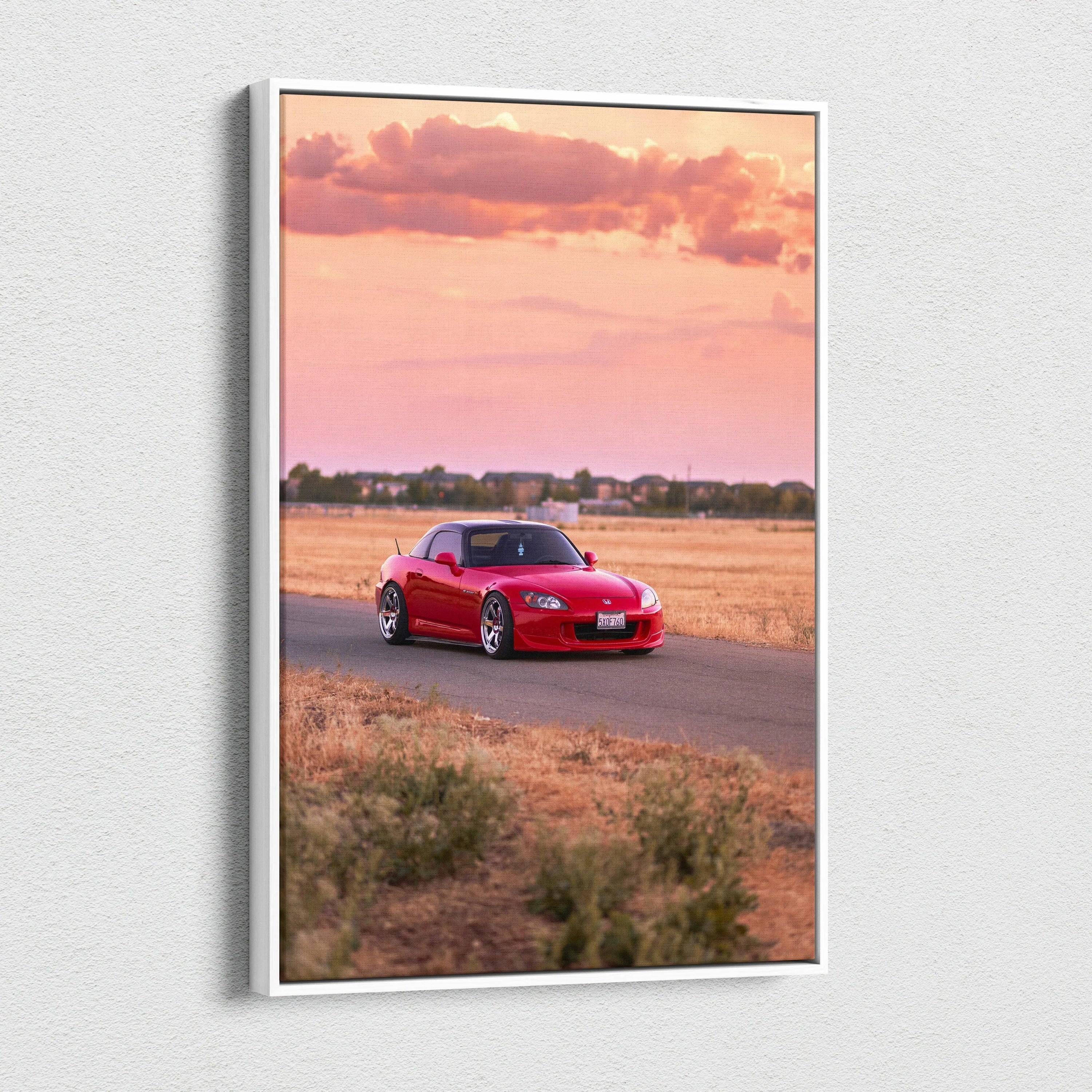 Honda S2000 red sports car on desert road canvas wall art with pink sunset sky.