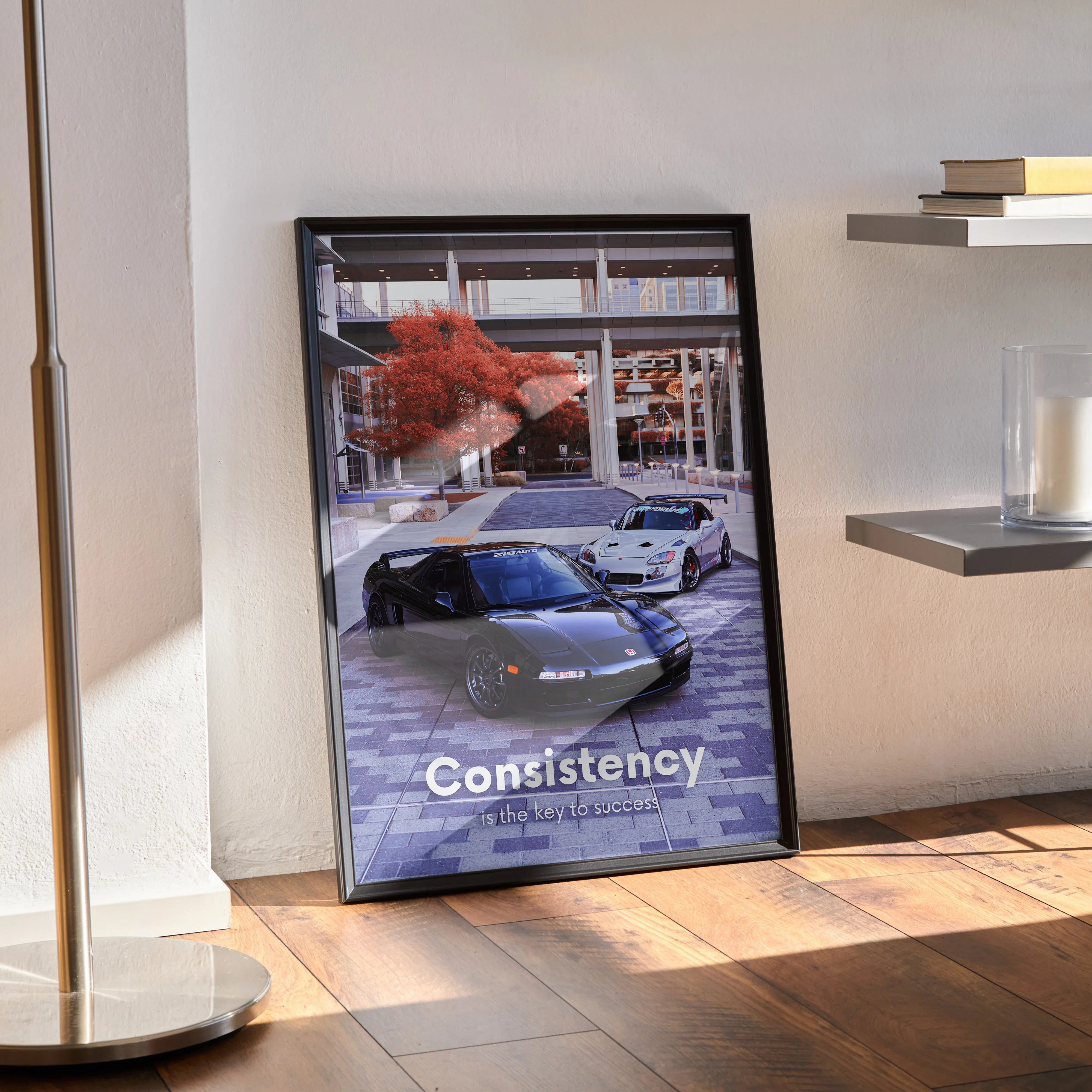Motivational poster wall art featuring Acura NSX and Honda S2000 with "Consistency" text in black frame.