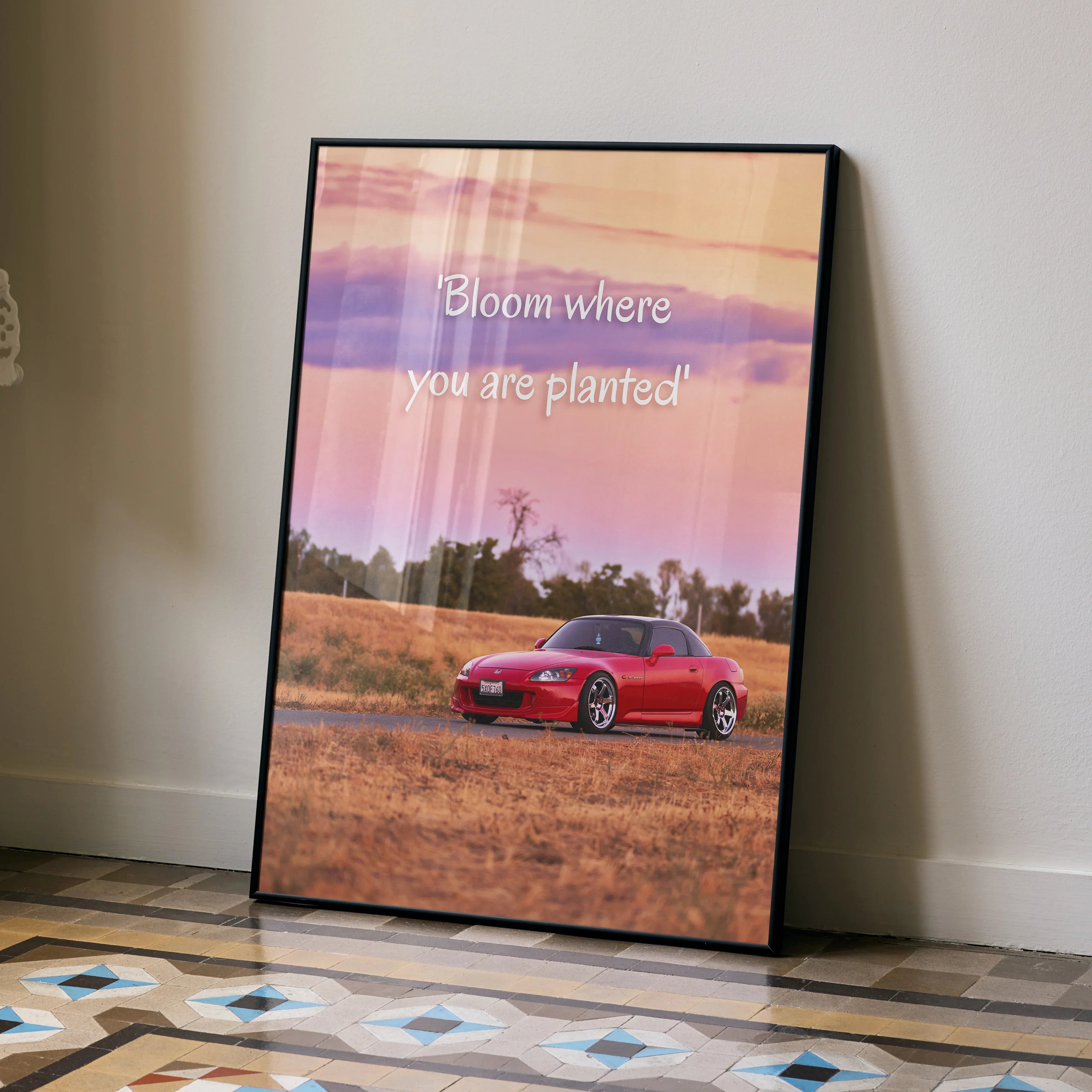 Motivational poster wall art with red Honda S2000 on field background and inspirational text.