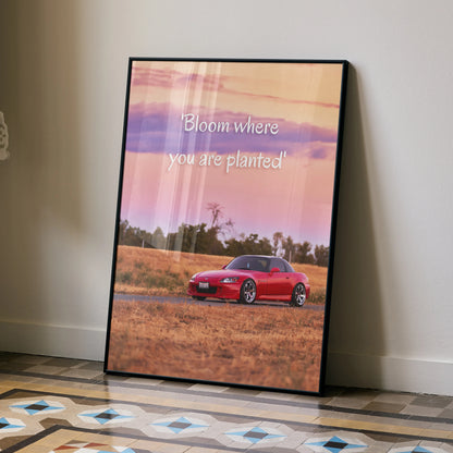 Motivational poster wall art with red Honda S2000 on field background and inspirational text.