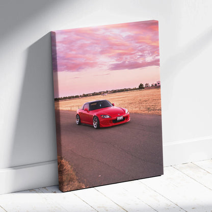 Red Honda S2000 on road at sunset with purple sky, vertical canvas wall art print.