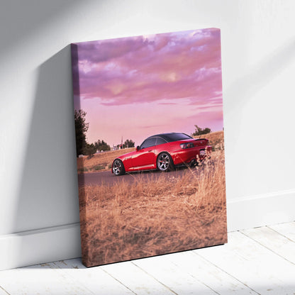 Red Honda S2000 convertible at sunset in dry field on vertical canvas wall art.