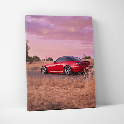 Red Honda S2000 sports car at sunset in dry grass landscape vertical canvas wall art.