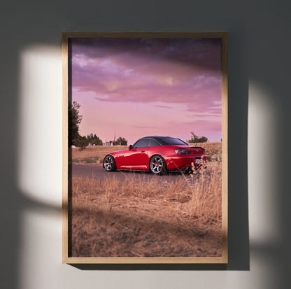 Honda S2000 red sports car at sunset in desert setting poster wall art in wooden frame.